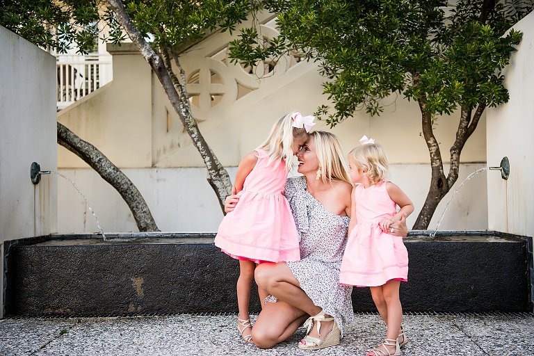 Mother and two daughters pose for family portraits in Rosemary Beach Florida