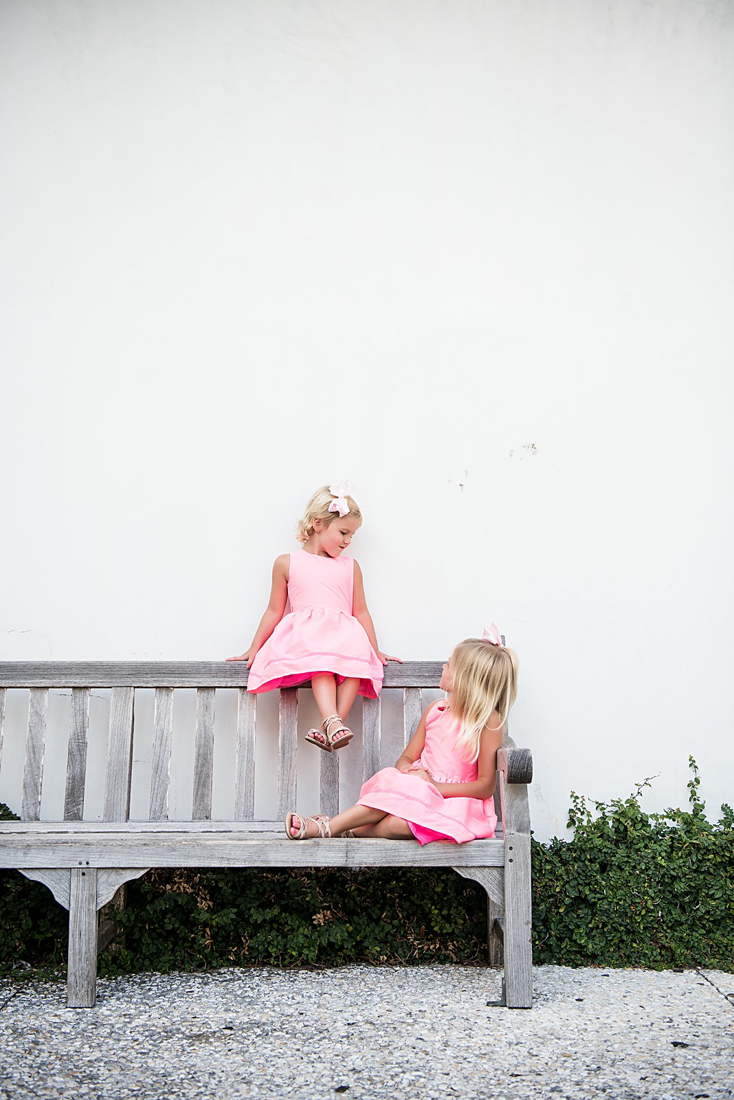 two young girls in pink by the Rosemary Beach Florida Post Office